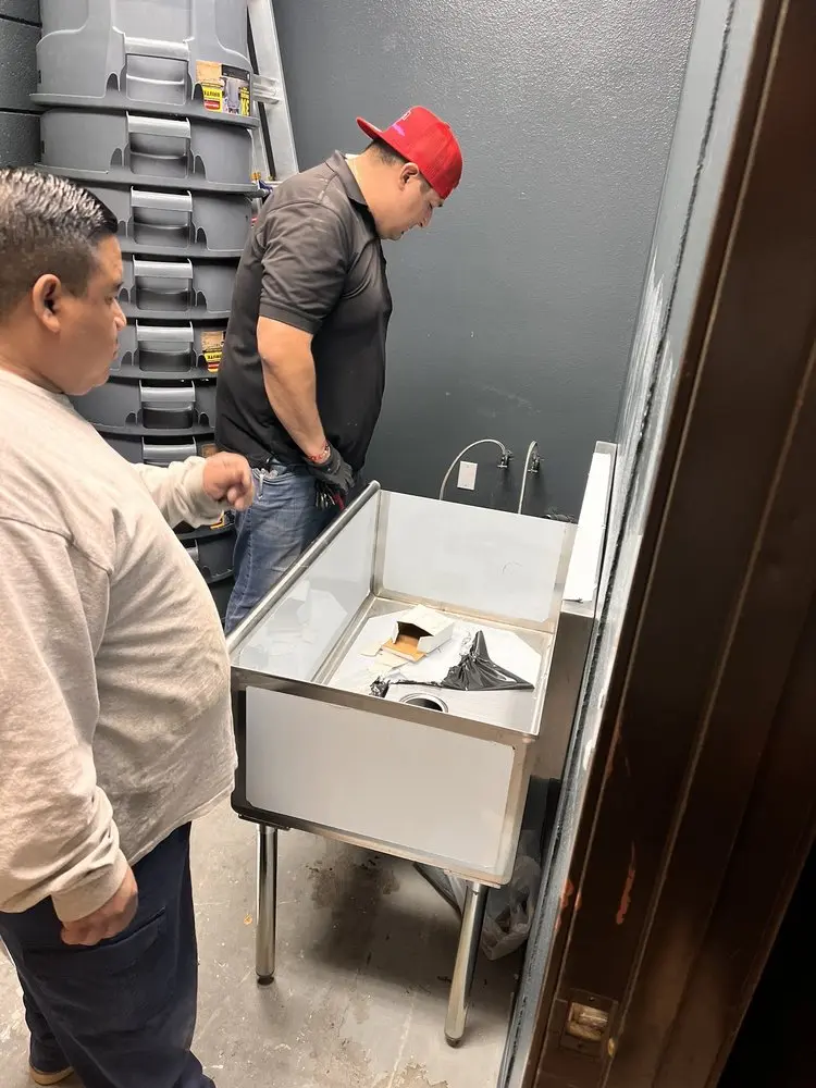 Commercial plumbing and sink installation in Olivarez